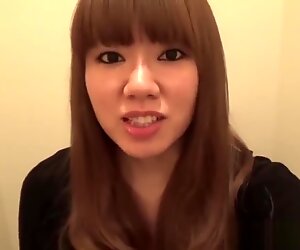 Asian teen pees in toilet