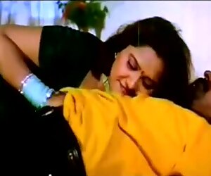 Sharmili in outdoor Bed Bosom Exposed