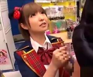 Schoolgirl Giving Handjob On Her Knees Cum To Palm In The Sexshop